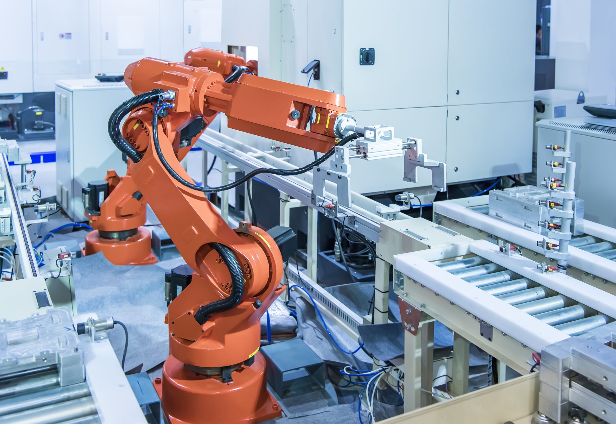 Automatic industrial robotic robot working, industry 4.0 and technology concept